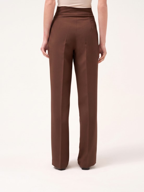 Trousers with buttoned strap