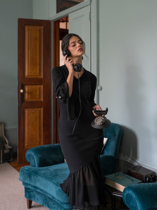Vestido em malha com folho