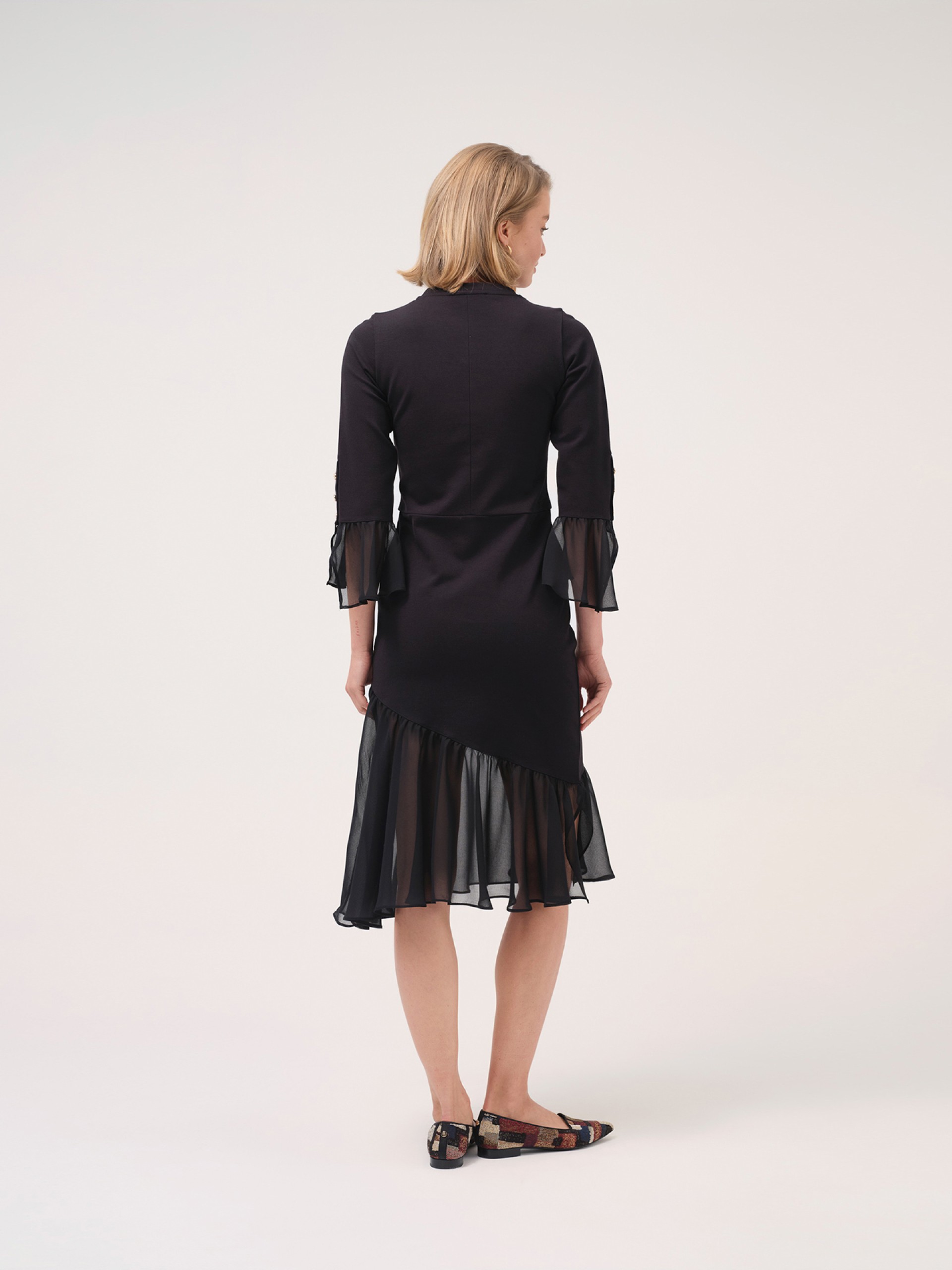 Vestido em malha com folho