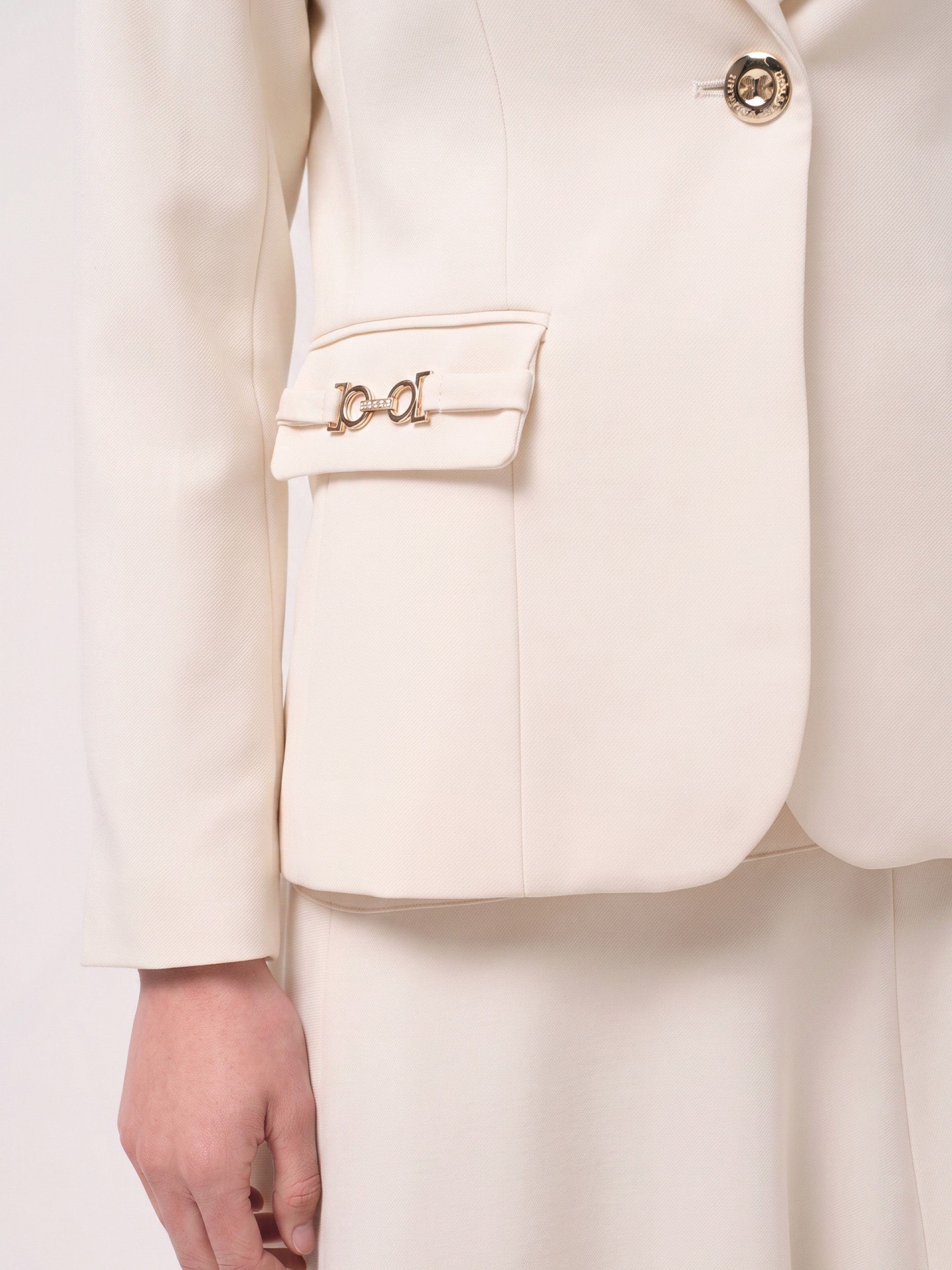Blazer with pocket appliqués